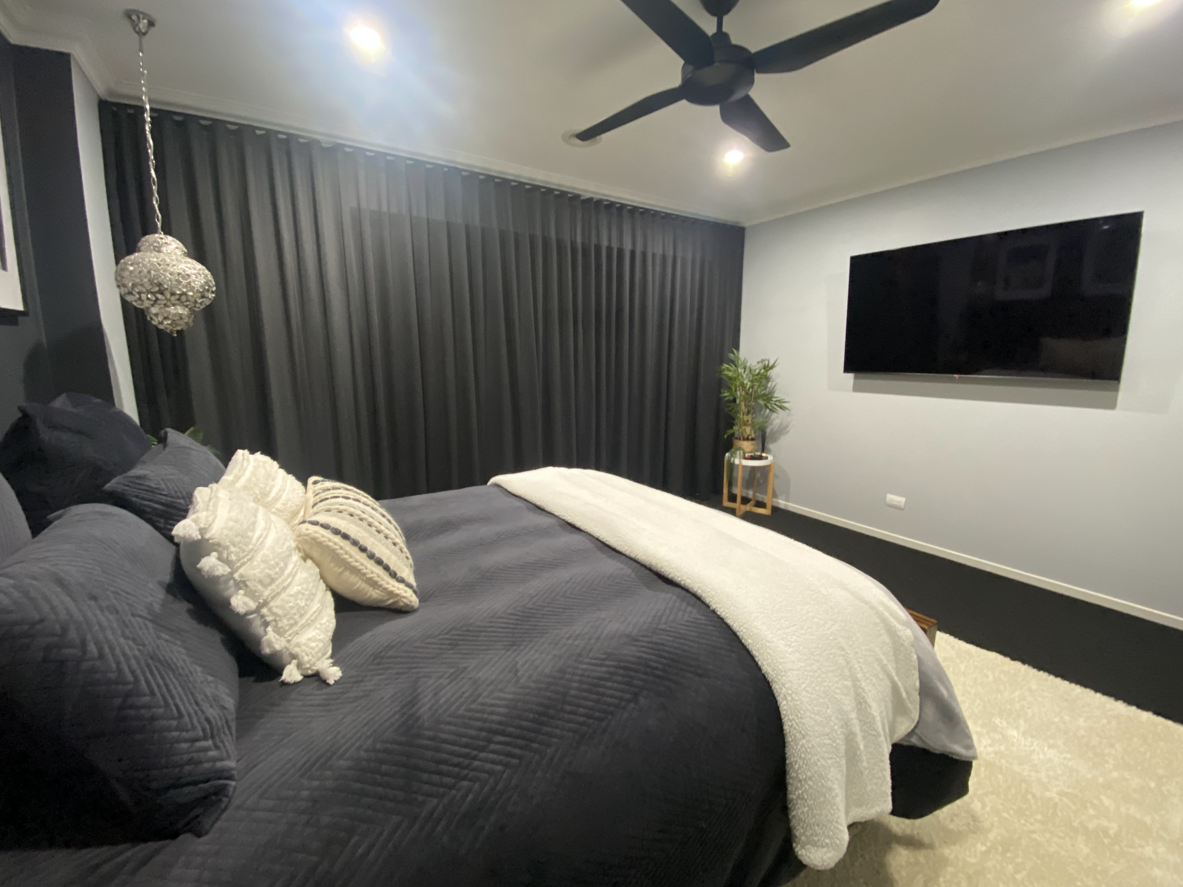 Bedroom fitted with Coverlight blockout blinds for daytime darkness